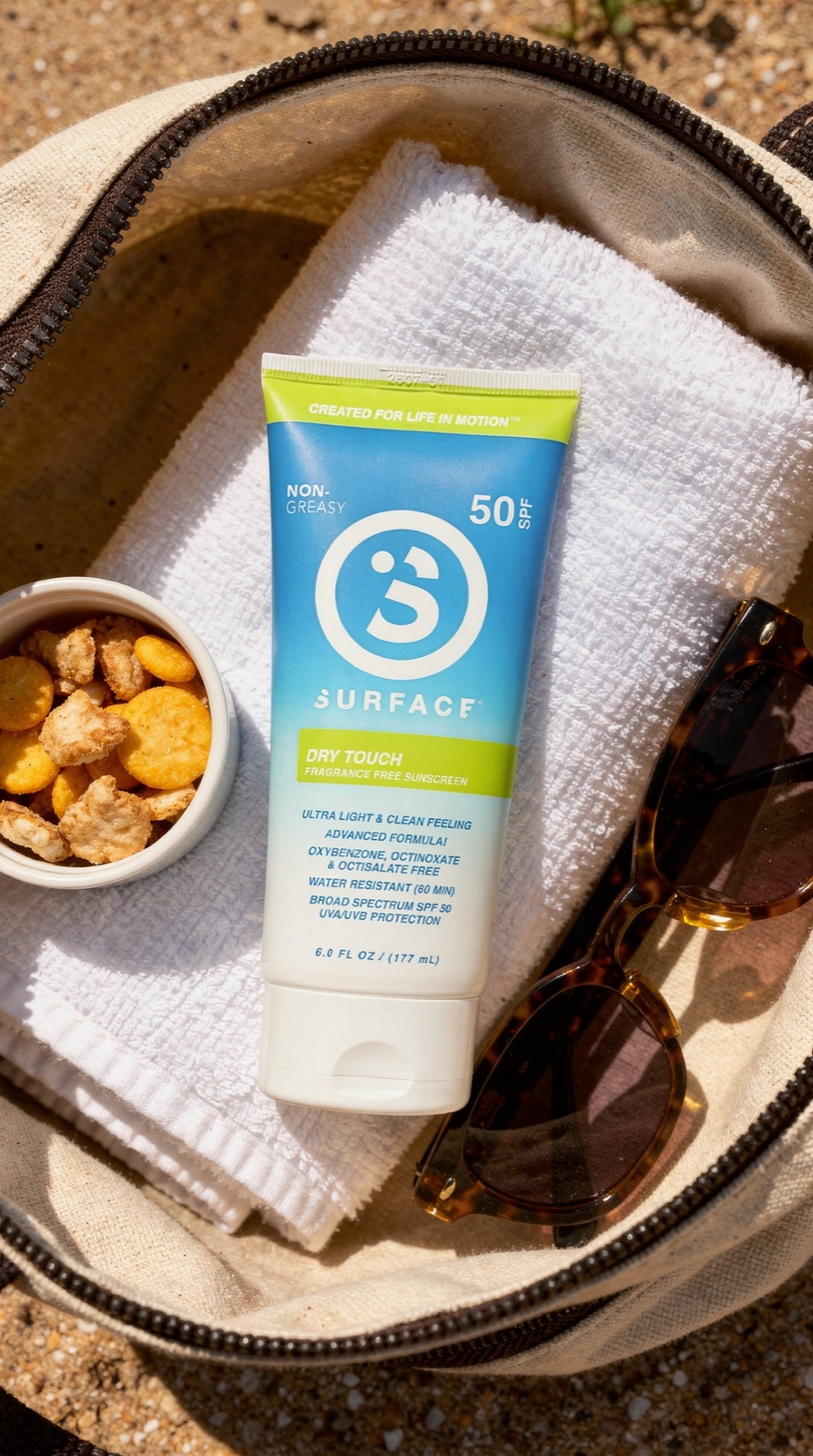 Surface Dry Touch in a beach bag flatlay